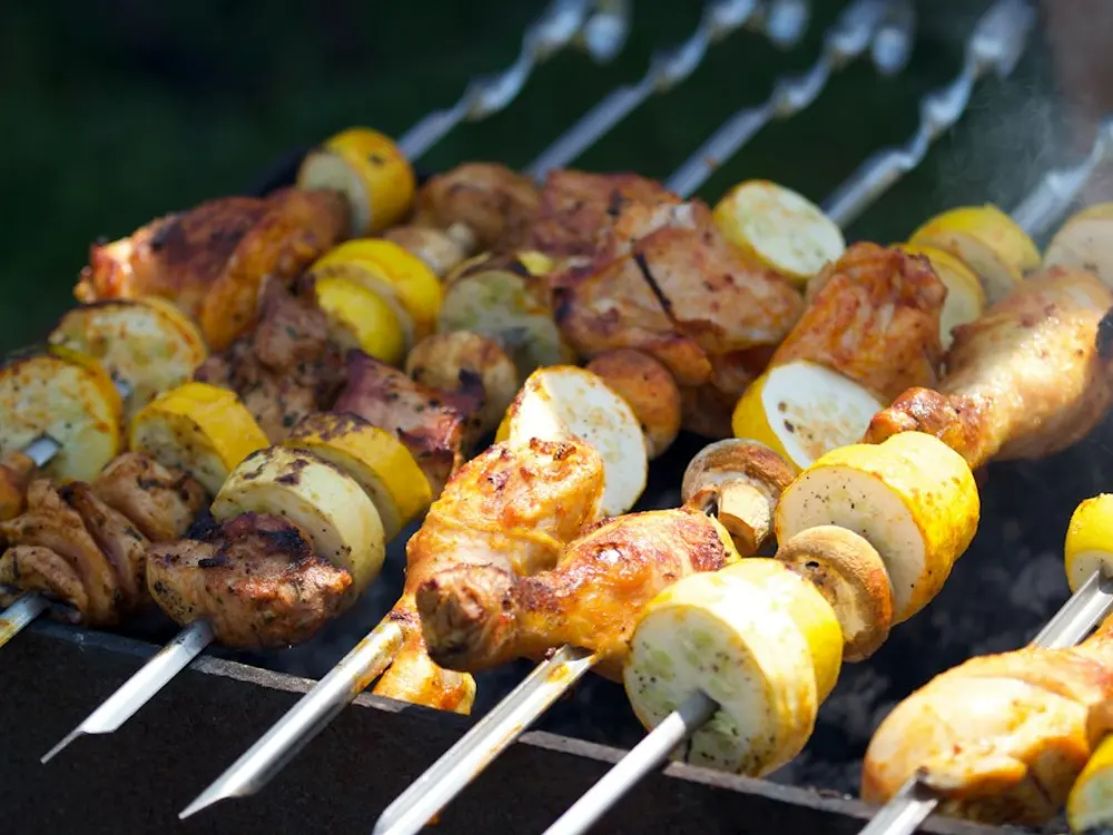 Chicken and vegetable skewers on the grill